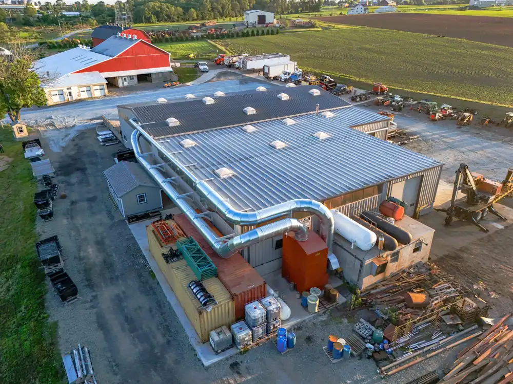 Aerial view of Ideal Hydraulics with exterior collector and ductwork | CSI Collector Systems - Dust & Fume Collection Systems