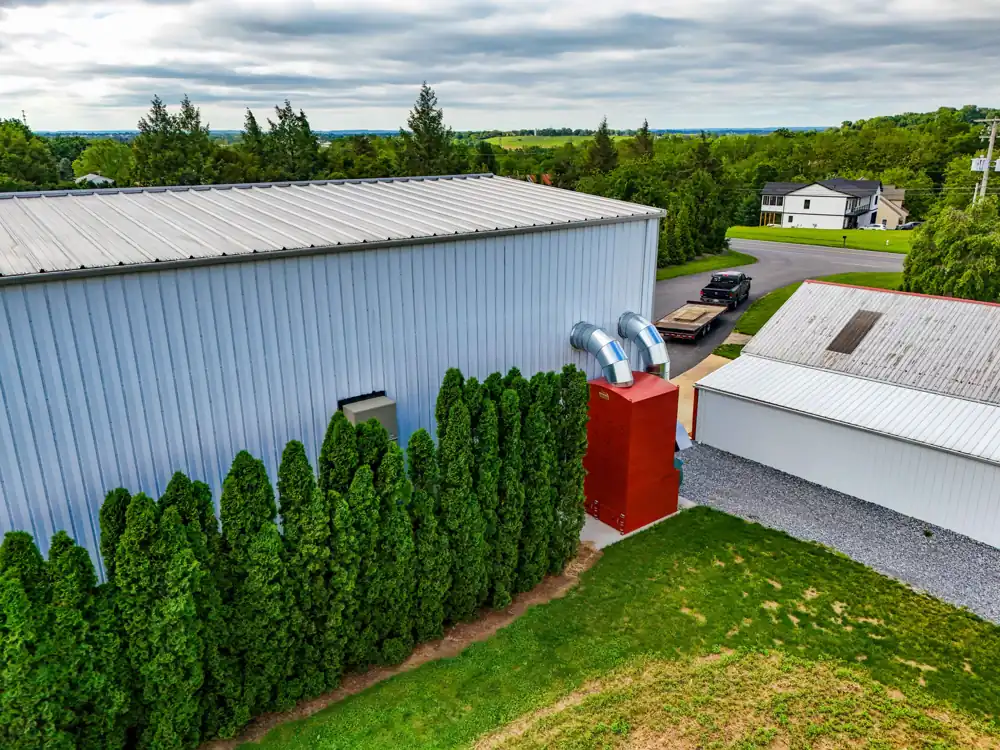 Collector installed beside Rock Ridge Steel's building | CSI Collector Systems - Dust & Fume Collection Systems